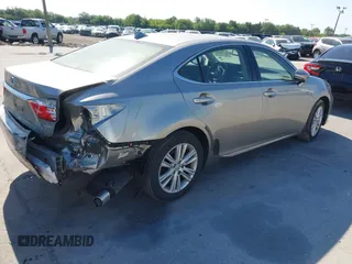 2015 Lexus ES with VIN JTHBK1GG4F2173074, listed as a IAAI auction lot 42051609 with 87,753 mi miles. Bid and sale history available at carsss.com. Image 4.
