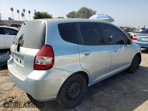 2007 Honda Fit with VIN JHMGD37477S055538, listed as a Copart auction lot 73222124 with 125,205 mi miles and Salvage Title. Bid and sale history available at carsss.com. Image 3.