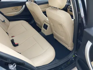 2018 BMW 3 Series 320i with VIN WBA8E1G57JNU88781, listed as a IAAI auction lot 42019246 with 56,820 mi miles. Bid and sale history available at carsss.com. Image 8.