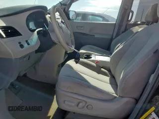 2012 Toyota Sienna LE AAS с VIN 5TDKK3DC7CS183942, выставлен на аукционе Copart как лот 57597305 с пробегом 245 971 миль миль и Списание • Salvage title. История ставок и продаж доступна на DreamBid. Изображение 7.