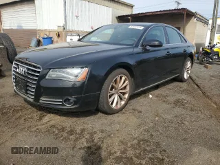 2011 Audi A8 z VIN WAUAVAFD9BN001074, wystawiony jako Copart lot #51672175 z przebiegiem 130 823 mil mil oraz Nie do naprawy • Non repairable. Historia ofert i sprzedaży dostępna na DreamBid. Obrazek 1.