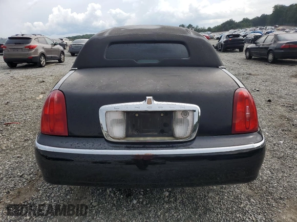 2000 Lincoln Town Car Executive с VIN 1L1FM81W8YY771526, выставлен на аукционе Copart как лот 65654725 с пробегом 51 048 миль миль и Чистый • Clean title. История ставок и продаж доступна на DreamBid. Изображение 6.