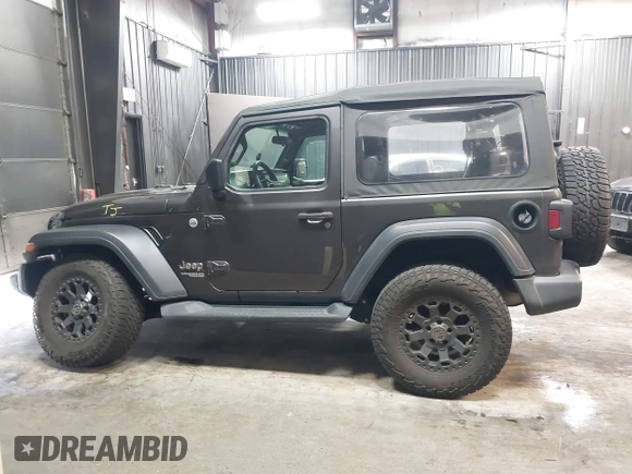 2021 Jeep Wrangler Sport S with VIN 1C4HJXAG2MW502452, listed as a IAAI auction lot 42031159 with 87,952 mi miles and . Bid and sale history available at DreamBid. Image 14.