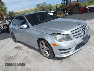 2012 Mercedes-Benz C-Class C 250 Sport with VIN WDDGF4HB8CA704655, listed as a IAAI auction lot 40293590 with 156,117 mi miles. Bid and sale history available at carsss.com. Image 1.