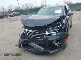 2022 Chevrolet Equinox Premier z VIN 2GNAXXEV9N6124156, wystawiony jako IAAI lot #42015711 z przebiegiem 65 808 mil mil oraz . Historia ofert i sprzedaży dostępna na DreamBid. Obrazek 12.