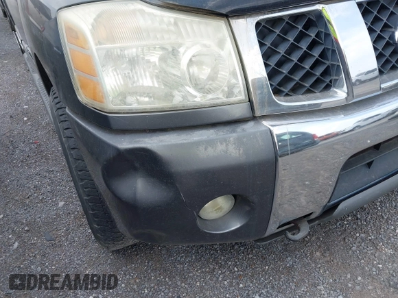 2005 Nissan Titan LE z VIN 1N6AA07B05N557667, wystawiony jako IAAI lot #42292562 z przebiegiem 197 874 mil mil oraz . Historia ofert i sprzedaży dostępna na DreamBid. Obrazek 13.