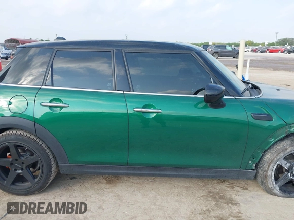 2022 MINI Hardtop 4 Door Cooper z VIN WMW33DK04N2P84250, wystawiony jako IAAI lot #42059692 z przebiegiem 34 238 mil mil oraz . Historia ofert i sprzedaży dostępna na DreamBid. Obrazek 14.
