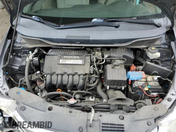 2011 Honda Insight EX with VIN JHMZE2H77BS006079, listed as a Copart auction lot 63873985 with 134,159 mi miles and Salvage title. Bid and sale history available at DreamBid. Image 11.