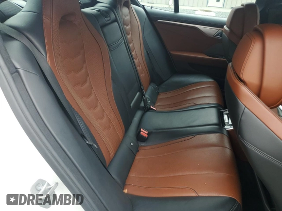 2022 BMW 8 Series 840i с VIN WBAGV4C03NCH43079, выставлен на аукционе Copart как лот 59799665 с пробегом 28 069 миль миль и Списание • Salvage title. История ставок и продаж доступна на DreamBid. Изображение 10.
