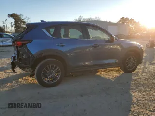 2021 Mazda CX-5 Sport with VIN JM3KFABMXM1313156, listed as a Copart auction lot 41365285 with 42,828 mi miles and Salvage Title. Bid and sale history available at carsss.com. Image 3.