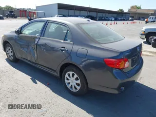 2009 Toyota Corolla with VIN 1NXBU40E99Z108425, listed as a IAAI auction lot 39553892 with 208,165 mi miles and . Bid and sale history available at DreamBid. Image 3.