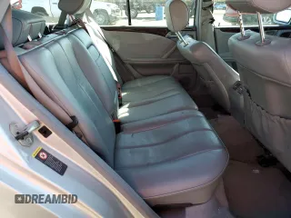 2001 Mercedes-Benz E-Class AWD with VIN WDBJH82J11X056425, listed as a Copart auction lot 48612975 with 130,900 mi miles and Salvage Title. Bid and sale history available at carsss.com. Image 10.