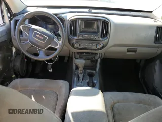 2015 GMC Canyon 2WD with VIN 1GTG5AE38F1156671, listed as a Copart auction lot 85194924 with 123,597 mi miles and Salvage Title. Bid and sale history available at DreamBid. Image 8.