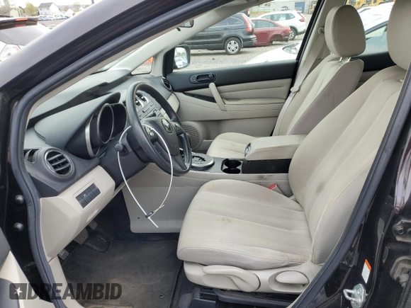 2010 Mazda CX-7 SV z VIN JM3ER2WMXA0341433, wystawiony jako Copart lot #53474815 z przebiegiem 106 410 mil mil oraz Czysty tytuł • Clean title. Historia ofert i sprzedaży dostępna na DreamBid. Obrazek 7.