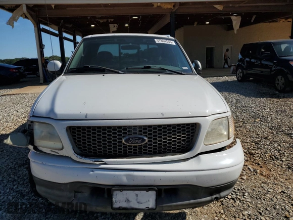 2003 Ford F-150 XL with VIN 1FTRX07W03KD12910, listed as a Copart auction lot 57864555 with Not provided miles and Salvage title. Bid and sale history available at DreamBid. Image 5.