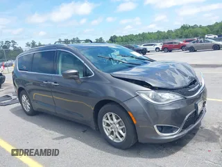 2020 Chrysler Pacifica Touring L with VIN 2C4RC1BG1LR269004, listed as a IAAI auction lot 42287228 with 71,498 mi miles and . Bid and sale history available at DreamBid. Image 1.