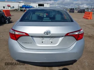 2016 Toyota Corolla L z VIN 5YFBURHE1GP394996, wystawiony jako IAAI lot #41971802 z przebiegiem 189 033 mil mil oraz . Historia ofert i sprzedaży dostępna na DreamBid. Obrazek 16.