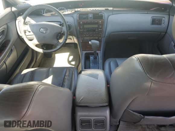 2002 Toyota Avalon XL z VIN 4T1BF28BX2U250961, wystawiony jako Copart lot #50400245 z przebiegiem 351 091 mil mil oraz Szkoda całkowita • Salvage title. Historia ofert i sprzedaży dostępna na DreamBid. Obrazek 8.