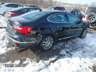 2015 Kia Cadenza Premium with VIN KNALN4D72F5181818, listed as a IAAI auction lot 41358864 with 113,460 mi miles. Bid and sale history available at carsss.com. Image 4.