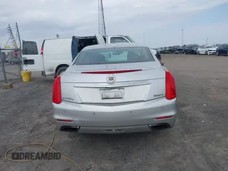 2014 Cadillac CTS Luxury AWD z VIN 1G6AX5SX2E0196881, wystawiony jako IAAI lot #41707633 z przebiegiem 169 168 mil mil oraz . Historia ofert i sprzedaży dostępna na DreamBid. Obrazek 16.
