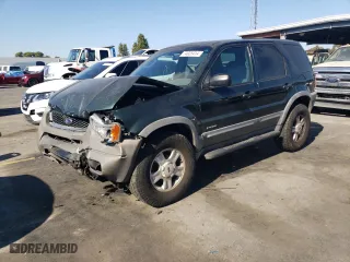 2002 Ford Escape Limited with VIN 1FMCU04162KA51672, listed as a Copart auction lot 74035414 with 140,752 mi miles and Salvage Title. Bid and sale history available at carsss.com. Image 1.