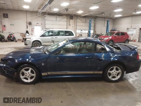 2002 Ford Mustang Standard z VIN 1FAFP40452F117630, wystawiony jako IAAI lot #41882744 z przebiegiem 85 218 mil mil oraz . Historia ofert i sprzedaży dostępna na DreamBid. Obrazek 15.