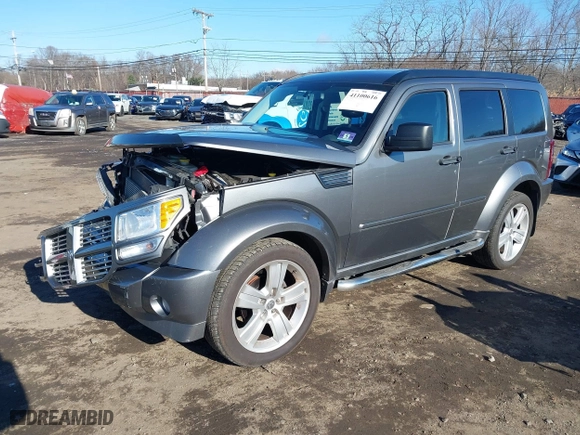 2011 Dodge Nitro Heat with VIN 1D4PU4GX9BW607188, listed as a IAAI auction lot 41100616 with 86,062 mi miles. Bid and sale history available at carsss.com. Image 20.