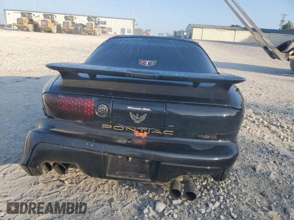 2000 Pontiac Firebird Formula z VIN 2G2FV22G4Y2175318, wystawiony jako Copart lot #68737224 z przebiegiem 229 394 mil mil oraz Szkoda całkowita • Salvage title. Historia ofert i sprzedaży dostępna na DreamBid. Obrazek 6.