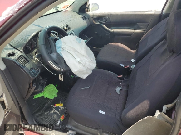 2007 Ford Focus S z VIN 1FAFP31N37W130031, wystawiony jako Copart lot #60123195 z przebiegiem 154 833 mil mil oraz Szkoda całkowita • Salvage title. Historia ofert i sprzedaży dostępna na DreamBid. Obrazek 7.