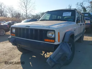 1997 Jeep Cherokee Sport with VIN 1J4FJ68S3VL551278, listed as a IAAI auction lot 41660577 with 282,264 mi miles. Bid and sale history available at carsss.com. Image 6.