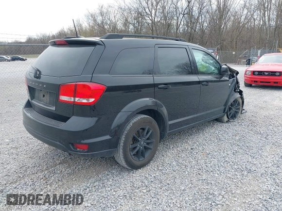 2019 Dodge Journey SE with VIN 3C4PDCBB7KT844691, listed as a IAAI auction lot 41784711 with 107,000 mi miles and . Bid and sale history available at DreamBid. Image 4.