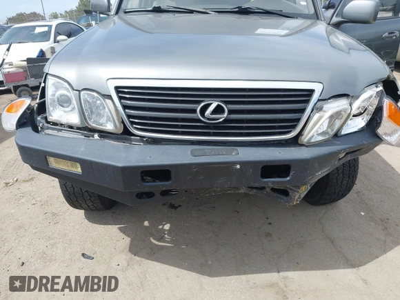 2001 Lexus LX 470 z VIN JTJHT00WX13509489, wystawiony jako IAAI lot #42227083 z przebiegiem 360 283 mil mil oraz . Historia ofert i sprzedaży dostępna na DreamBid. Obrazek 6.