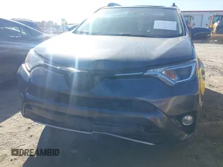 2018 Toyota RAV4 XLE with VIN JTMWFREV9JJ200629, listed as a IAAI auction lot 41821491 with 184,706 mi miles. Bid and sale history available at carsss.com. Image 6.
