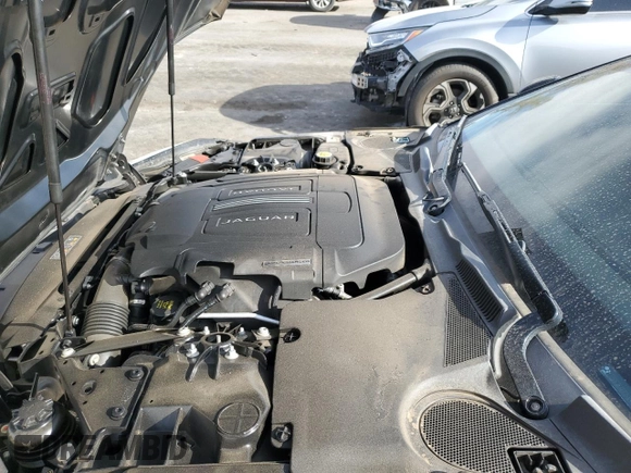 2014 Jaguar F-Type V6 with VIN SAJWA6E7XE8K09479, listed as a Copart auction lot 49477115 with 93,755 mi miles and Salvage Title. Bid and sale history available at DreamBid. Image 11.
