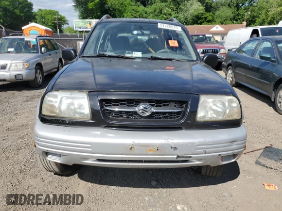1999 Suzuki Grand Vitara z VIN JS3TD62VXX4100236, wystawiony jako Copart lot #57228075 z przebiegiem Nie podano mil oraz Szkody całkowita. Historia ofert i sprzedaży dostępna na DreamBid. Obrazek 5.