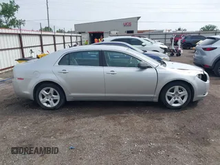 2009 Chevrolet Malibu 1LS with VIN 1G1ZG57B194180787, listed as a IAAI auction lot 42147639 with 48,411 mi miles and . Bid and sale history available at DreamBid. Image 14.