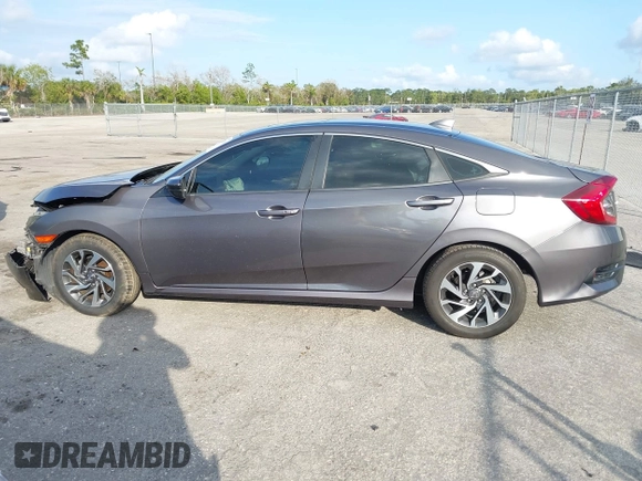 2017 Honda Civic EX z VIN 2HGFC2F75HH564169, wystawiony jako IAAI lot #41482206 z przebiegiem 93 363 mil mil oraz . Historia ofert i sprzedaży dostępna na DreamBid. Obrazek 15.