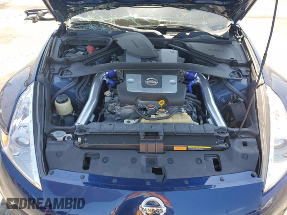 2016 Nissan 370Z z VIN JN1AZ4EH9GM933658, wystawiony jako Copart lot #48760215 z przebiegiem 70 682 mil mil oraz Szkoda całkowita • Salvage title. Historia ofert i sprzedaży dostępna na DreamBid. Obrazek 12.