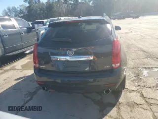 2015 Cadillac SRX Luxury Collection z VIN 3GYFNBE36FS608322, wystawiony jako Copart lot #88860835 z przebiegiem 141 627 mil mil oraz Szkoda całkowita • Salvage title. Historia ofert i sprzedaży dostępna na DreamBid. Obrazek 6.