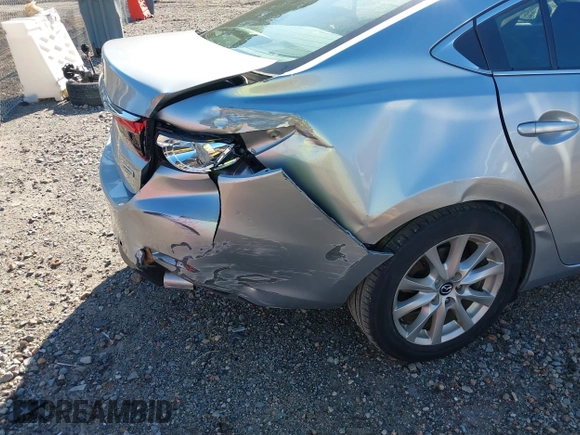 2016 Mazda 6 i Sport with VIN JM1GJ1U50G1412026, listed as a IAAI auction lot 41820838 with 130,262 mi miles and . Bid and sale history available at DreamBid. Image 6.