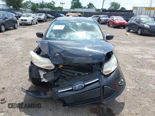 2012 Ford Focus SE z VIN 1FAHP3F26CL157551, wystawiony jako IAAI lot #42697232 z przebiegiem 135 024 mil mil oraz . Historia ofert i sprzedaży dostępna na DreamBid. Obrazek 13.