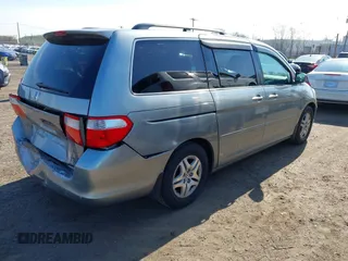 2006 Honda Odyssey EX-L with VIN 5FNRL38696B077792, listed as a IAAI auction lot 42048793 with 149,868 mi miles and . Bid and sale history available at carsss.com. Image 4.