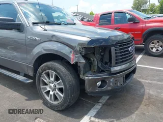2014 Ford F-150 XL with VIN 1FTEX1CM4EKF42963, listed as a IAAI auction lot 42593646 with 143,409 mi miles and . Bid and sale history available at DreamBid. Image 17.