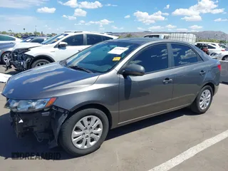 2013 Kia Forte EX with VIN KNAFU4A27D5724120, listed as a IAAI auction lot 42153084 with 154,860 mi miles. Bid and sale history available at carsss.com. Image 2.
