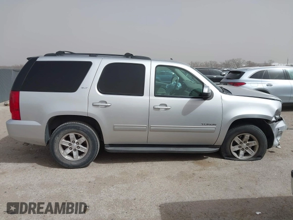 2014 GMC Yukon SLT with VIN 1GKS1CE02ER204452, listed as a IAAI auction lot 41804400 with 176,265 mi miles. Bid and sale history available at carsss.com. Image 13.
