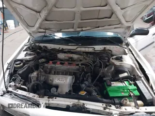 1990 Toyota Camry z VIN JT2SV21E5L3398379, wystawiony jako IAAI lot #41699413 z przebiegiem 100 136 mil mil oraz . Historia ofert i sprzedaży dostępna na DreamBid. Obrazek 10.