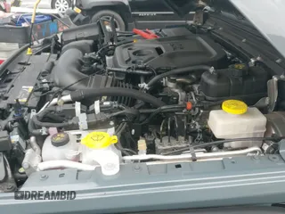 2024 Jeep Wrangler Sport S with VIN 1C4PJXDN8RW370133, listed as a IAAI auction lot 42453029 with 10,415 mi miles and . Bid and sale history available at DreamBid. Image 20.