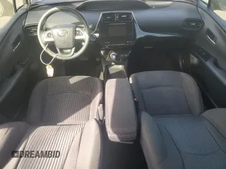 2016 Toyota Prius Two z VIN JTDKBRFU7G3520531, wystawiony jako Copart lot #57690325 z przebiegiem Nie podano mil oraz Czysty tytuł • Clean title. Historia ofert i sprzedaży dostępna na DreamBid. Obrazek 8.