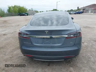 2013 Tesla Model S with VIN 5YJSA1CG9DFP27357, listed as a IAAI auction lot 42362514 with Not provided miles and . Bid and sale history available at DreamBid. Image 16.