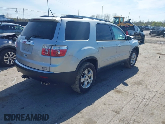 2012 GMC Acadia SLE with VIN 1GKKRPED2CJ405489, listed as a IAAI auction lot 42081026 with 130,932 mi miles. Bid and sale history available at carsss.com. Image 4.